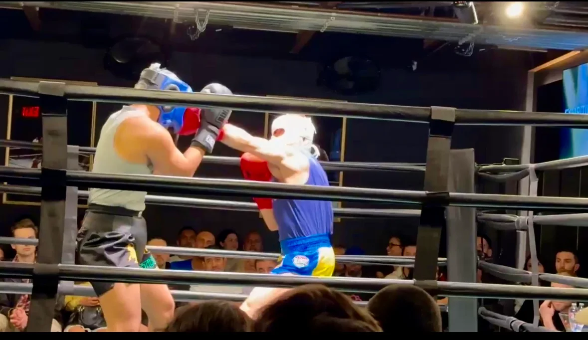 Alex won his first charity boxing match.